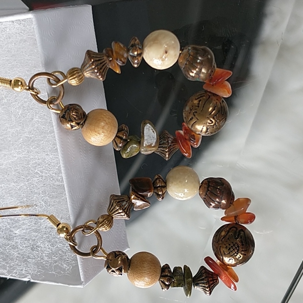 Stones beaded brass colored dangling round earrings